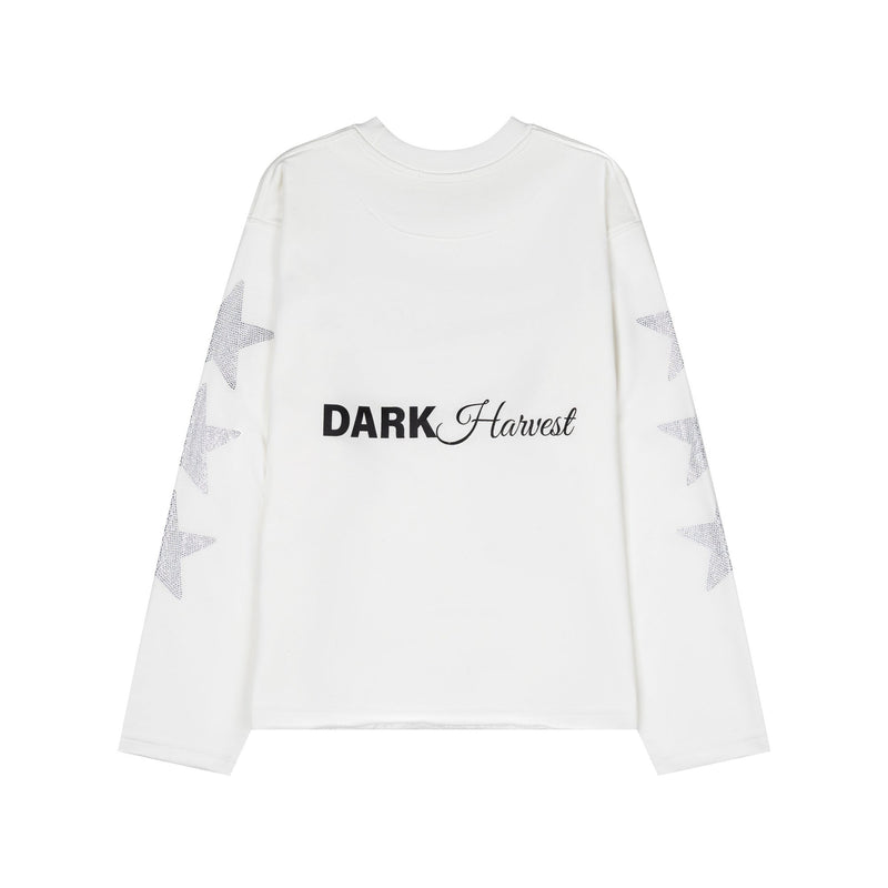 White long sleeve tee back view with star rhinestone sleeves and small chest-style print