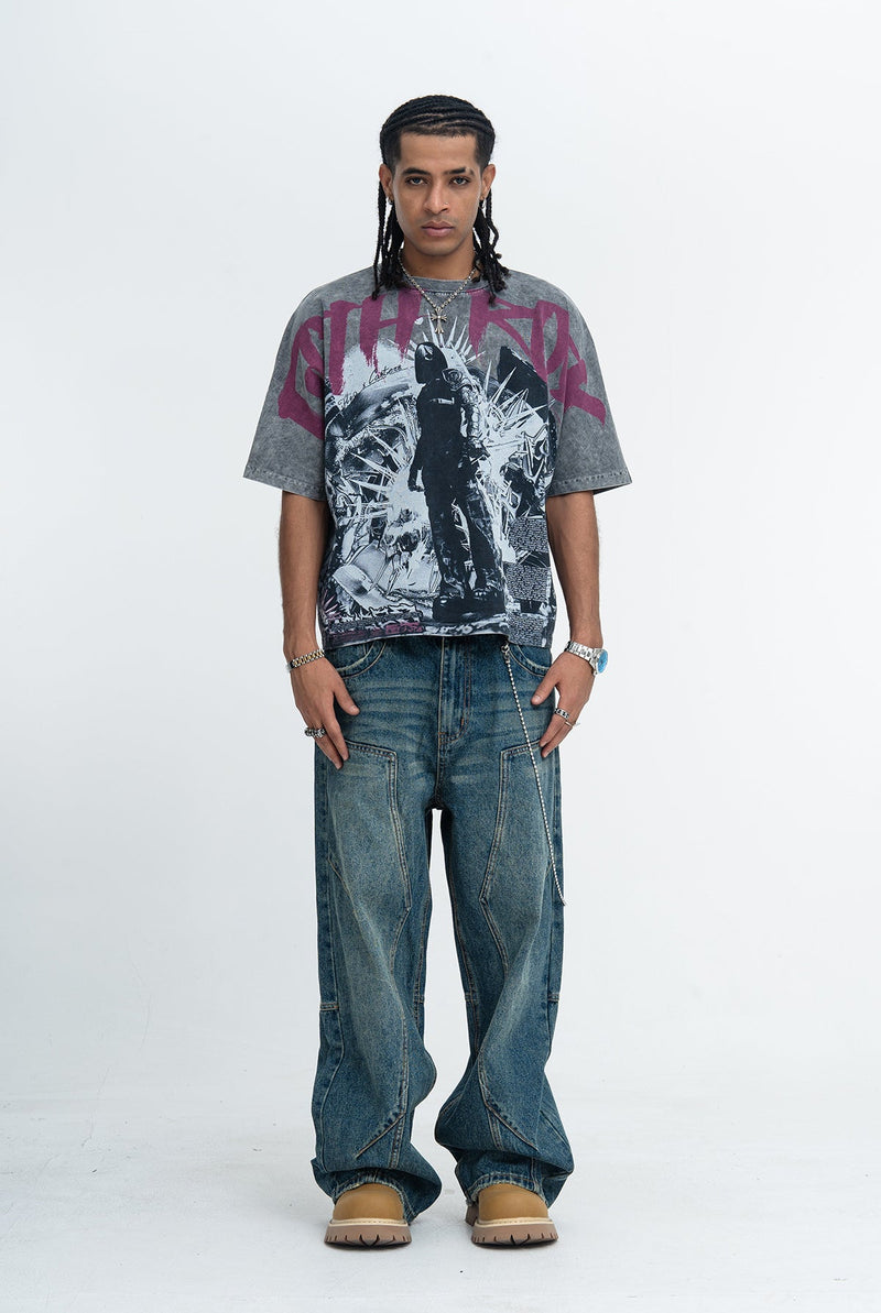 Oversized vintage washed goth graphic tee with dark print, paired with baggy jeans and boots on a model