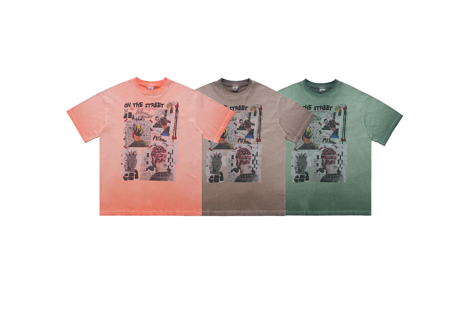 Three Omirad On The Street vintage wash collage graphic tees laid flat in coral pink, taupe brown, and sage green colorways