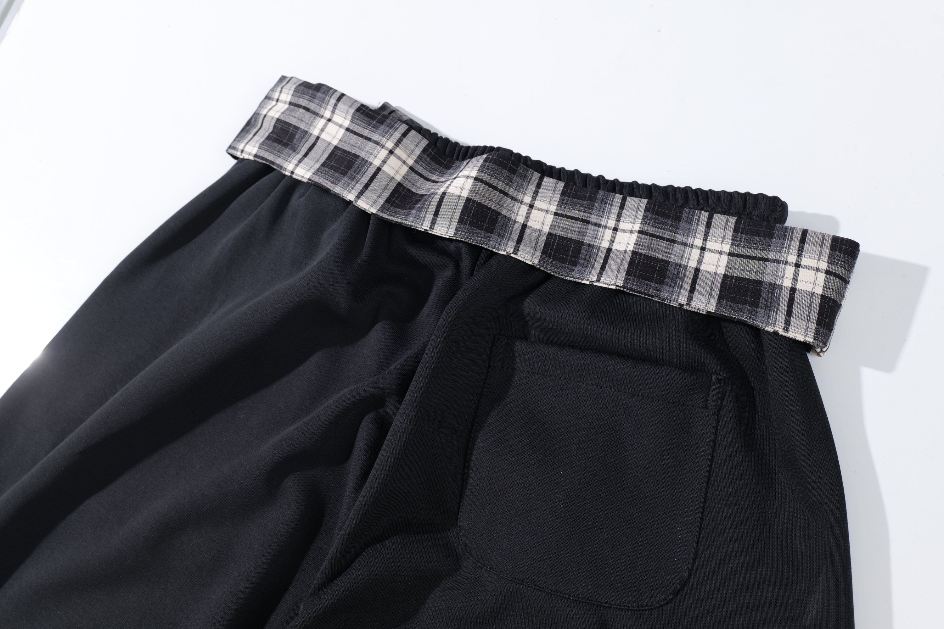 Omirad Plaid-Waist Barrel Track Pants | Bold Script Print