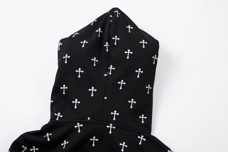 Close-up of black cross print hood and upper back of the bomber jacket