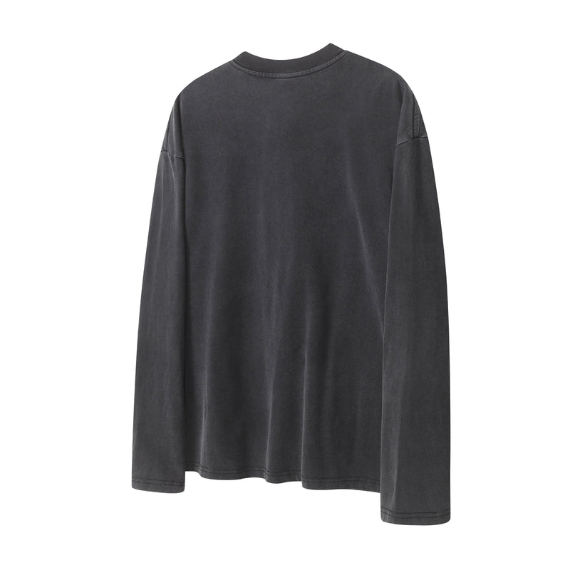 Back view of a black vintage wash long sleeve tee with plain solid finish