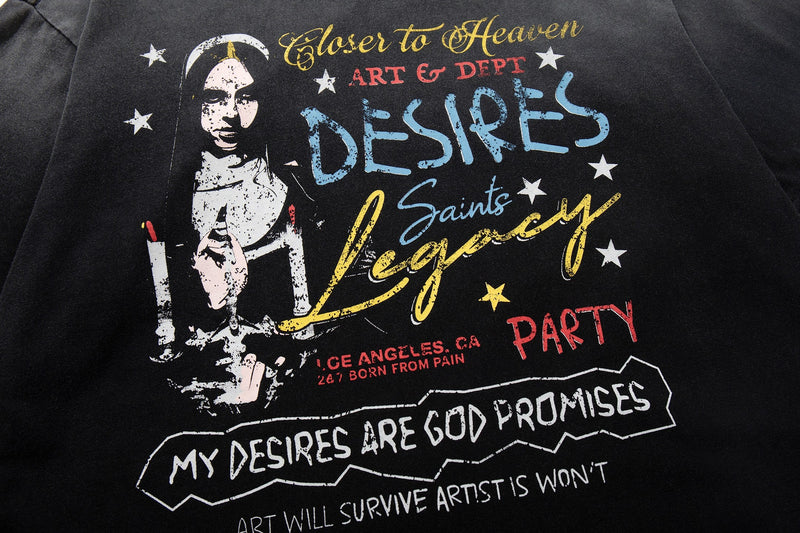 Black washed graphic tee with bold street art print, stars, and colorful distressed text reading Desires Legacy