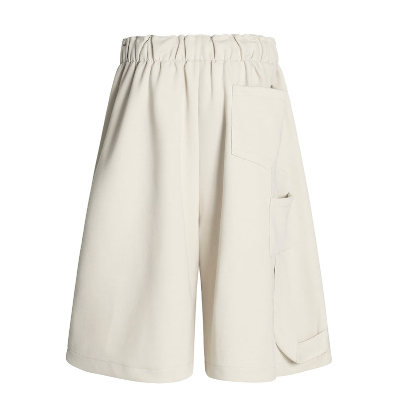 Cream wide-leg shorts back view with elastic waist and single back pocket