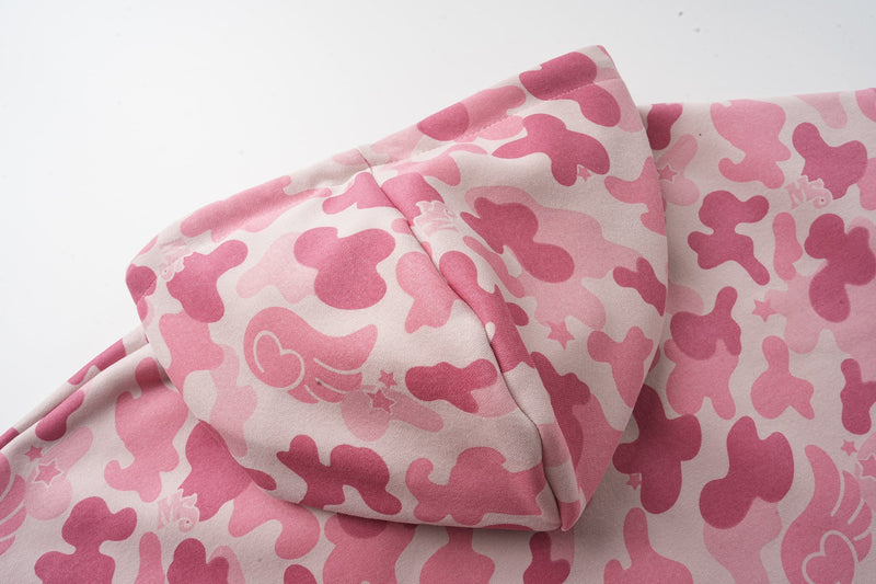 Close-up of pink camo hoodie hood seam and camo print texture
