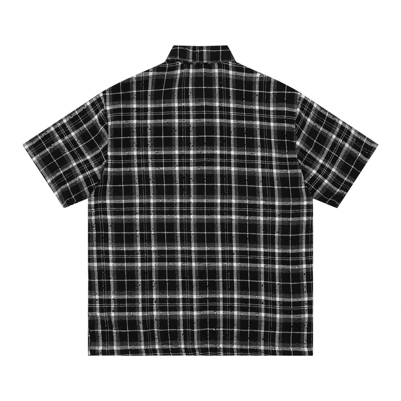 Black and white plaid short-sleeve shirt with a relaxed streetwear fit and bold check pattern on the back