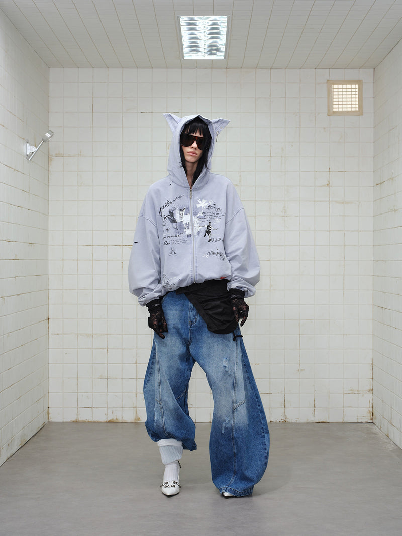 Full-length front view of gray graphic zip hoodie with hood up and sunglasses