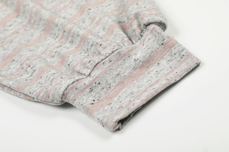 Close-up of sleeve cuff on gray striped long sleeve tee