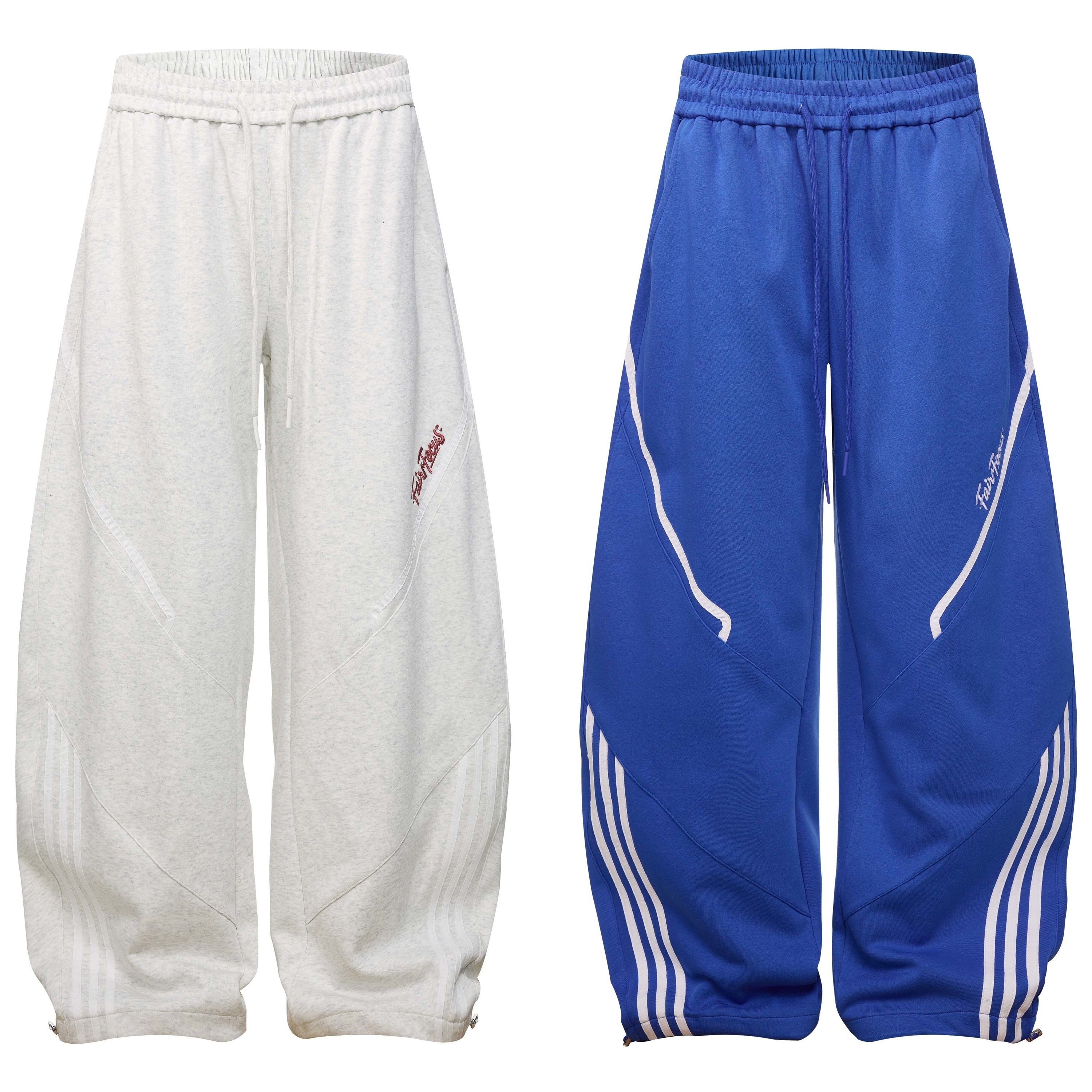 Heather white wide-leg curved-panel track pants with embroidered logo and triple-stripe detail on white background