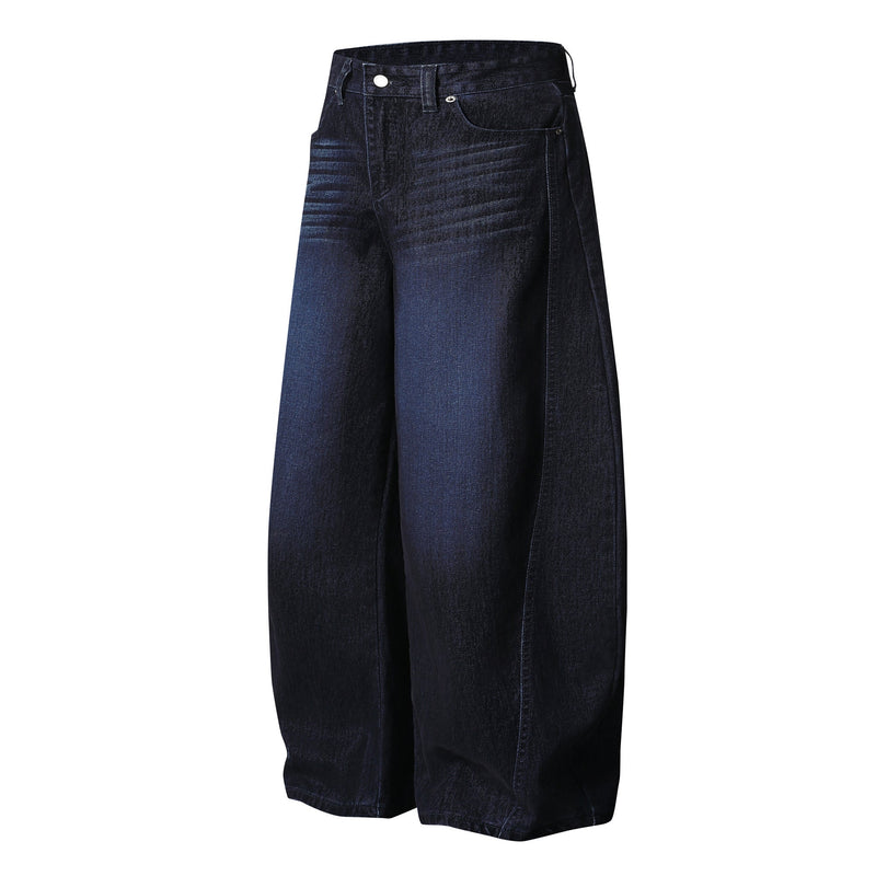 Faded indigo wide-leg denim pants angled front view with high waist and wide legs