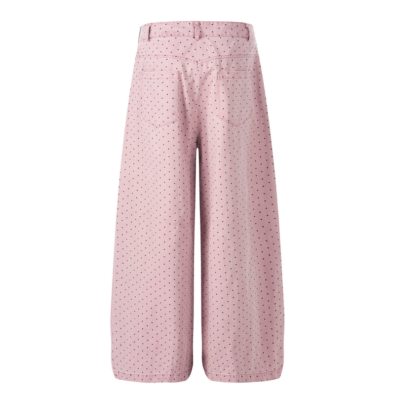Back view of pink polka dot wide-leg pants with patch pockets