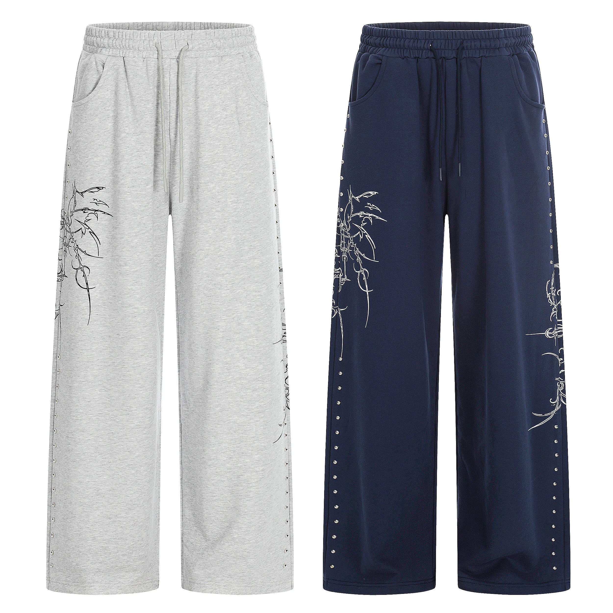 Heather grey wide-leg sweatpants with gothic line graphic print and metal rivet side detailing on white background