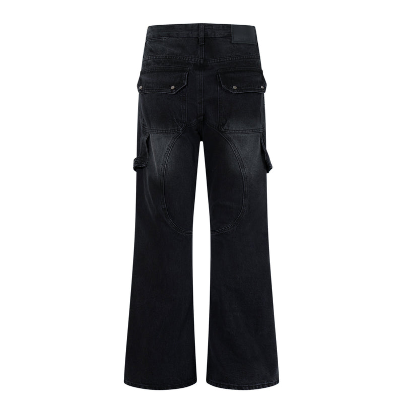 Back view of black cargo jeans with flap back pockets and wide legs