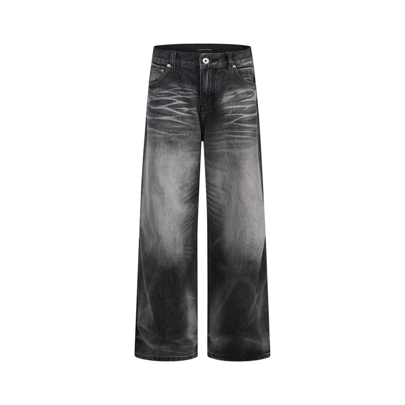 Front view of wide-leg jeans in dark charcoal denim with heavy faded whiskering