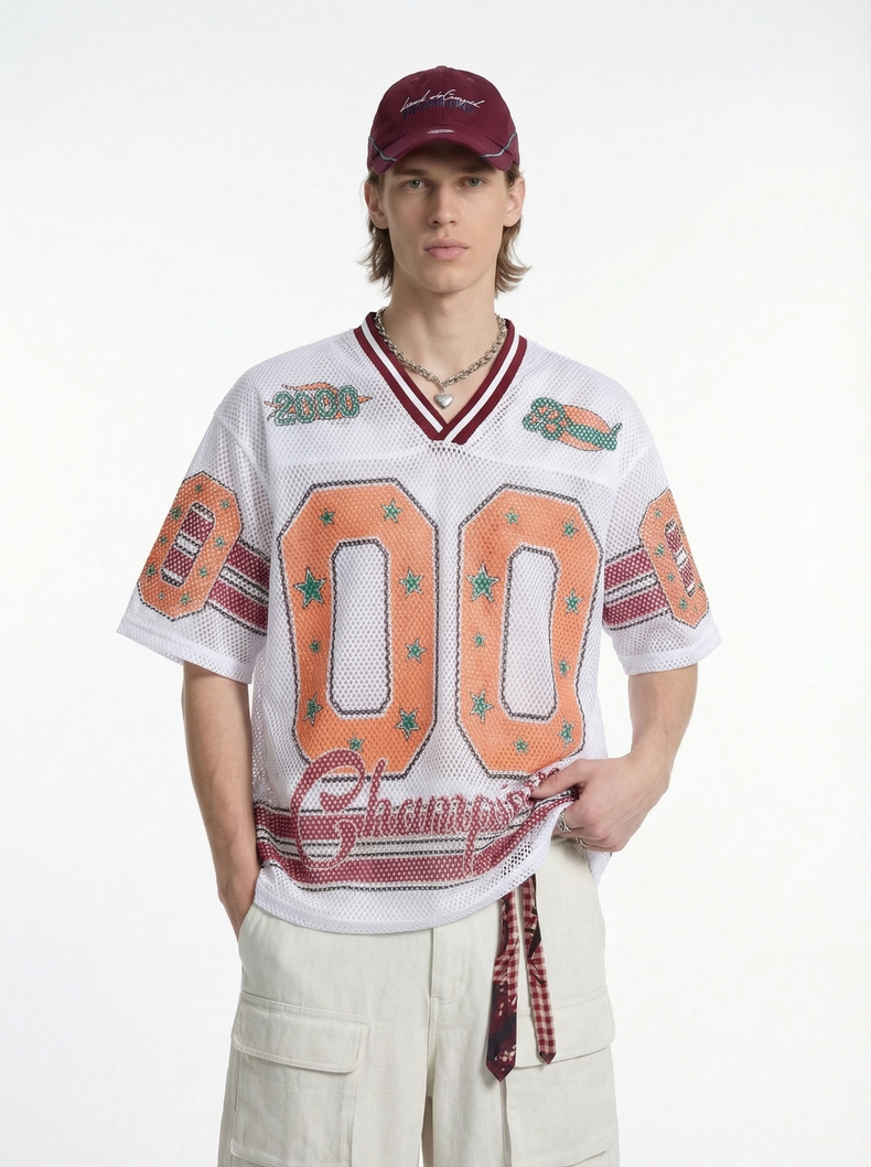 Male model wearing white mesh jersey T-shirt with orange 00 graphic, maroon trim, and retro streetwear styling