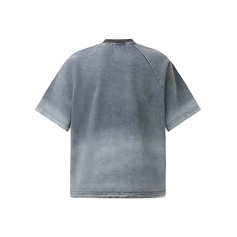 Vintage washed gray distressed graphic tee shown from the back with short sleeves and an oversized streetwear fit