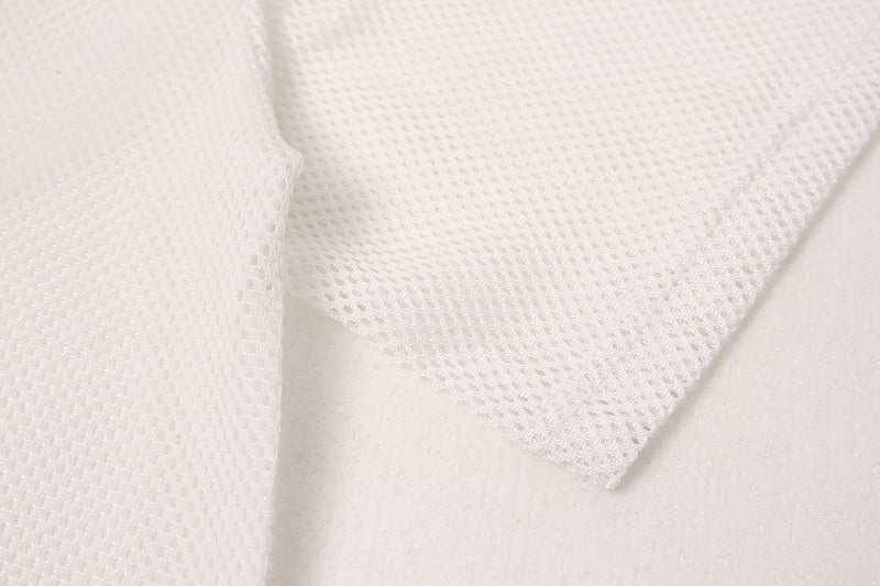 Close-up of white breathable mesh jersey fabric with oversized streetwear athletic texture and draped folds