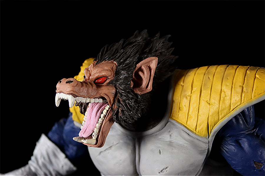 The Seakoff Great Ape Vegeta Collectible Figure from Dragon Ball Z features a detailed anthropomorphic creature with brown fur, red eyes, sharp fangs mid-roar, and dons gray and yellow armor. Sized at 36cm, this premium action figure is enhanced by its black background.