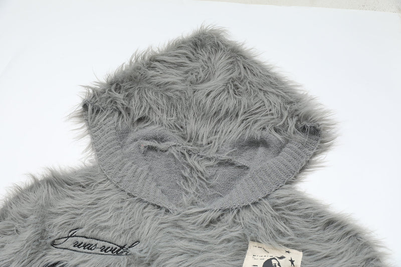 Close-up of gray fuzzy knit hood and ribbed neckline