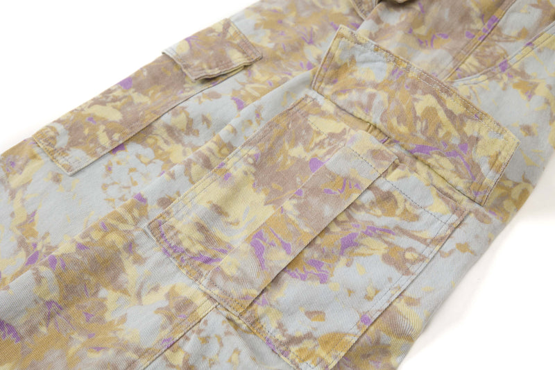 Diagonal back view of abstract camo pants with large cargo pocket and rear pocket flap