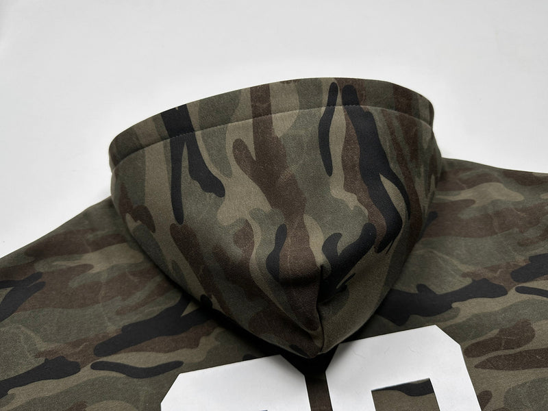Close-up of camo hoodie hood opening and lining