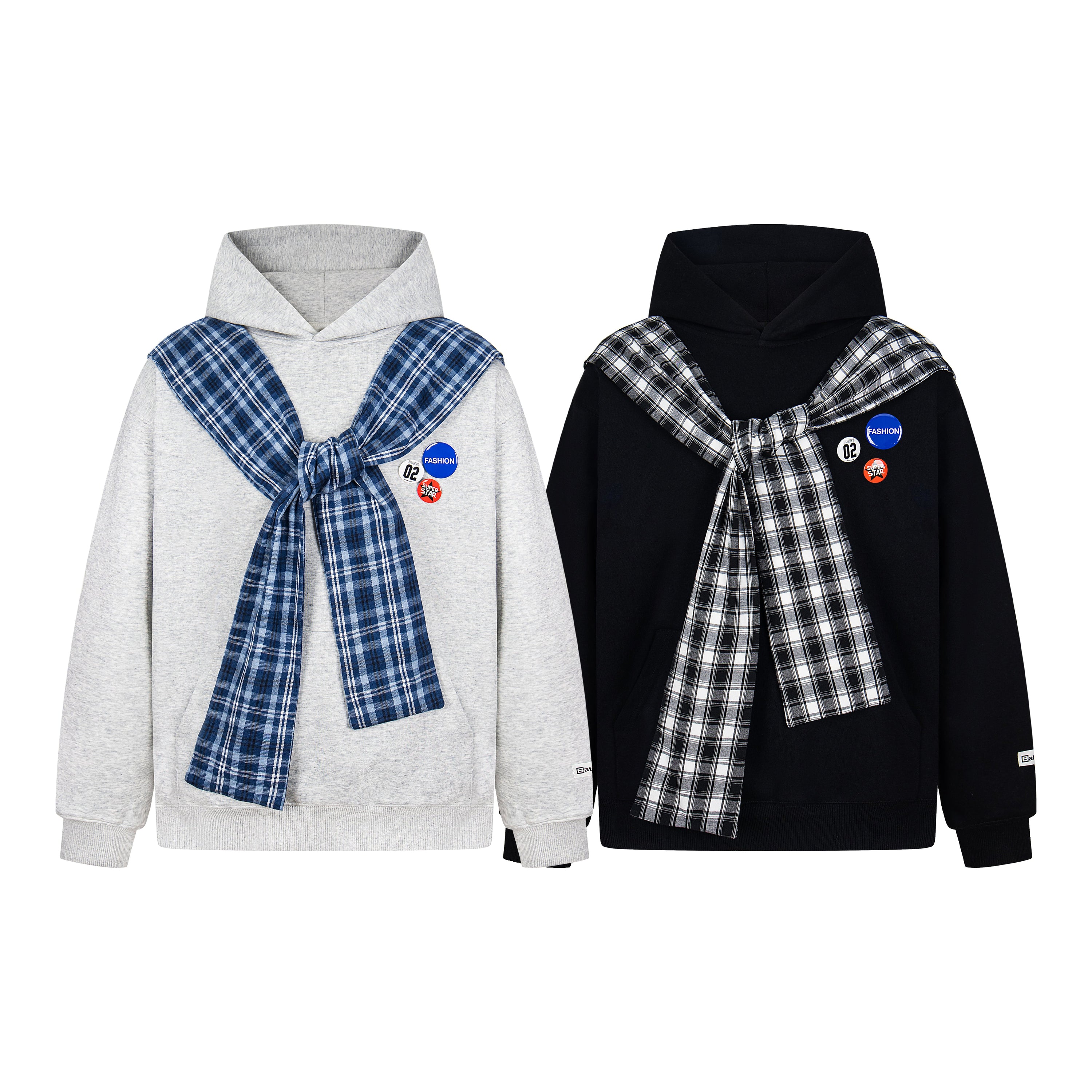 Grey hoodie with attached blue plaid scarf knotted at chest and decorative badge pins on white background