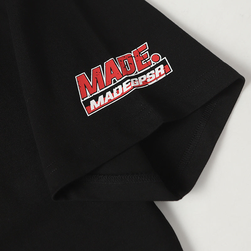 Black cotton T-shirt sleeve with bold red and white MADEGPSR racing graphic logo print