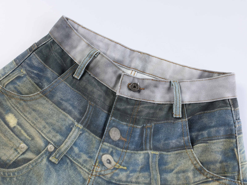 Close-up of the waistband on layered fade distressed denim jeans with button closure