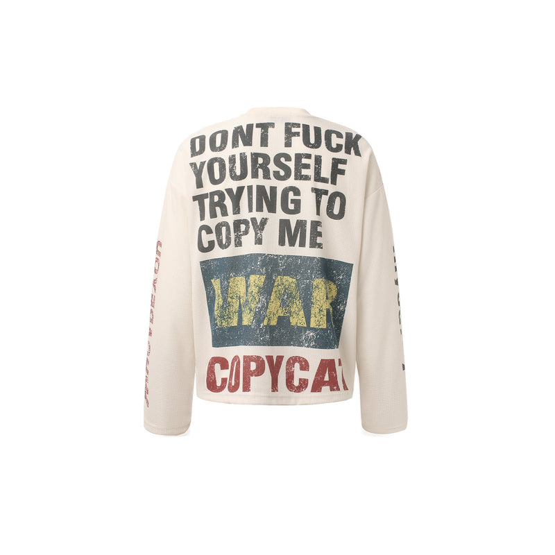Back of cream waffle long sleeve shirt with large distressed graphic text