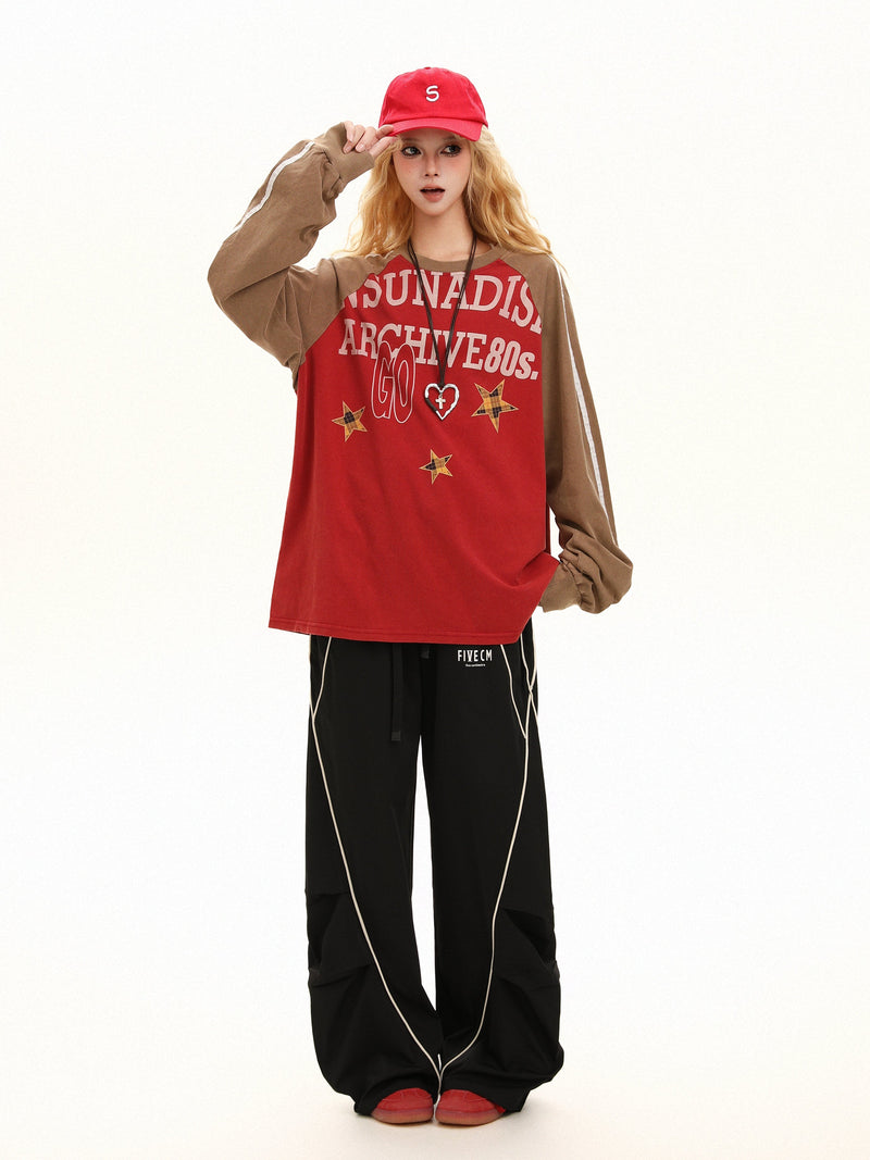 Full-length front view of red raglan long sleeve tee on model