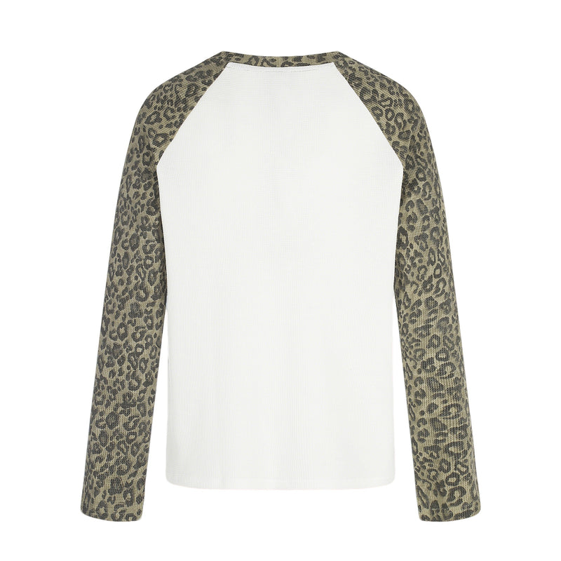 Back view of white waffle knit long sleeve shirt with leopard raglan sleeves