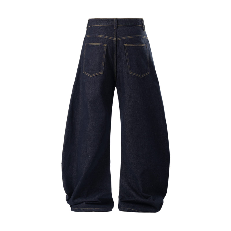 Back view of dark baggy jeans with oversized pockets and wide legs