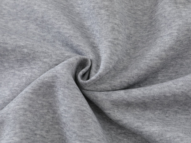 Close-up of heather gray hoodie fabric texture and drape