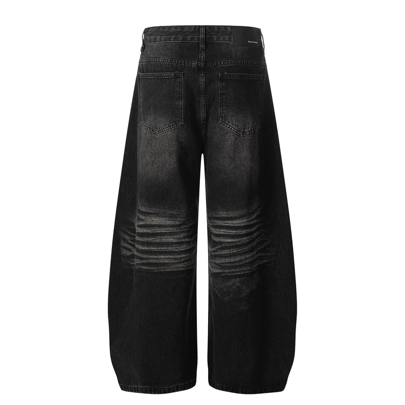 Black wide-leg jeans, back view with patch pockets and faded wash