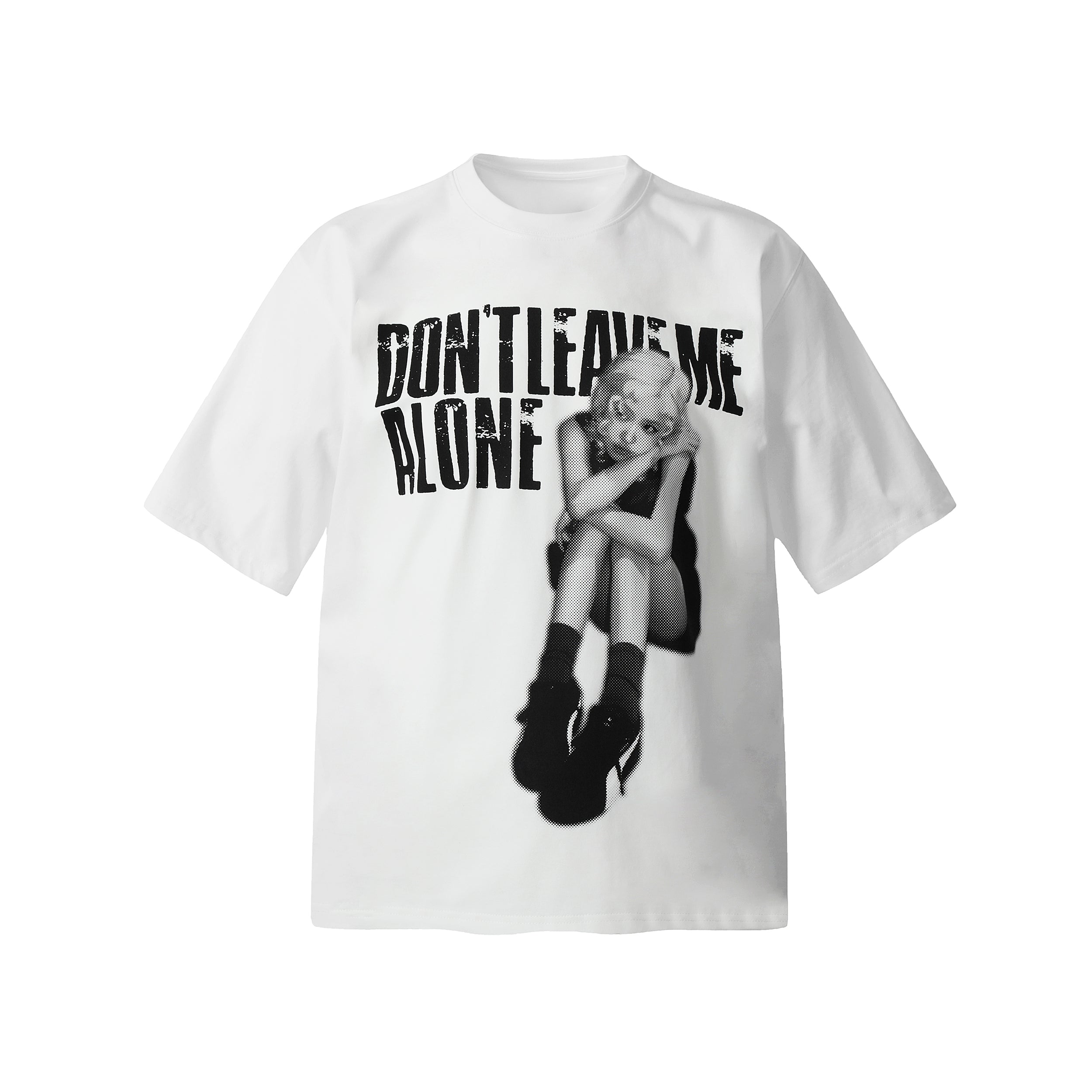White oversized graphic tee with Don't Leave Me Alone distressed text and halftone portrait print on the front