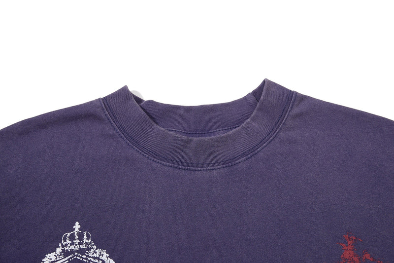 Purple washed T-shirt with a ribbed crew neck and small crest graphic print on the chest