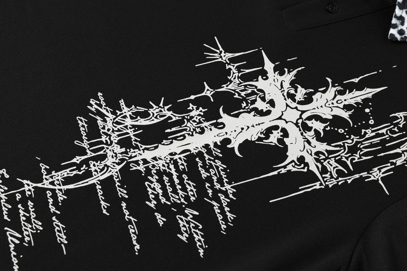Black polo shirt with a white gothic cross graphic and leopard print trim on the collar