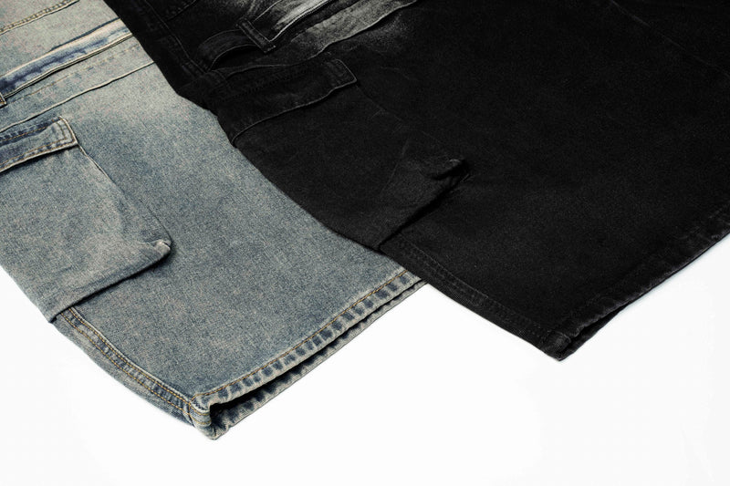 Close-up of blue and black jeans lower legs with cargo pocket details