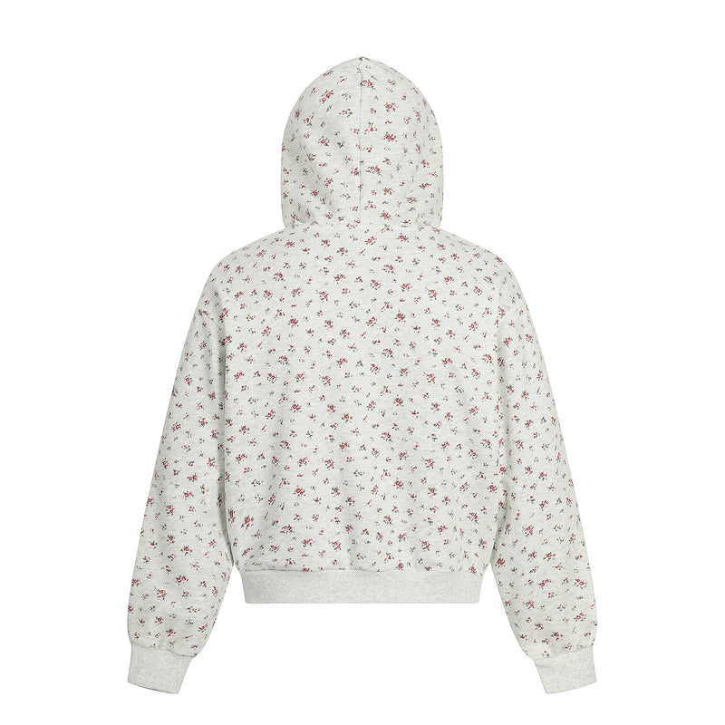 Back view of cream floral cropped hoodie with balaclava hood and ribbed cuffs