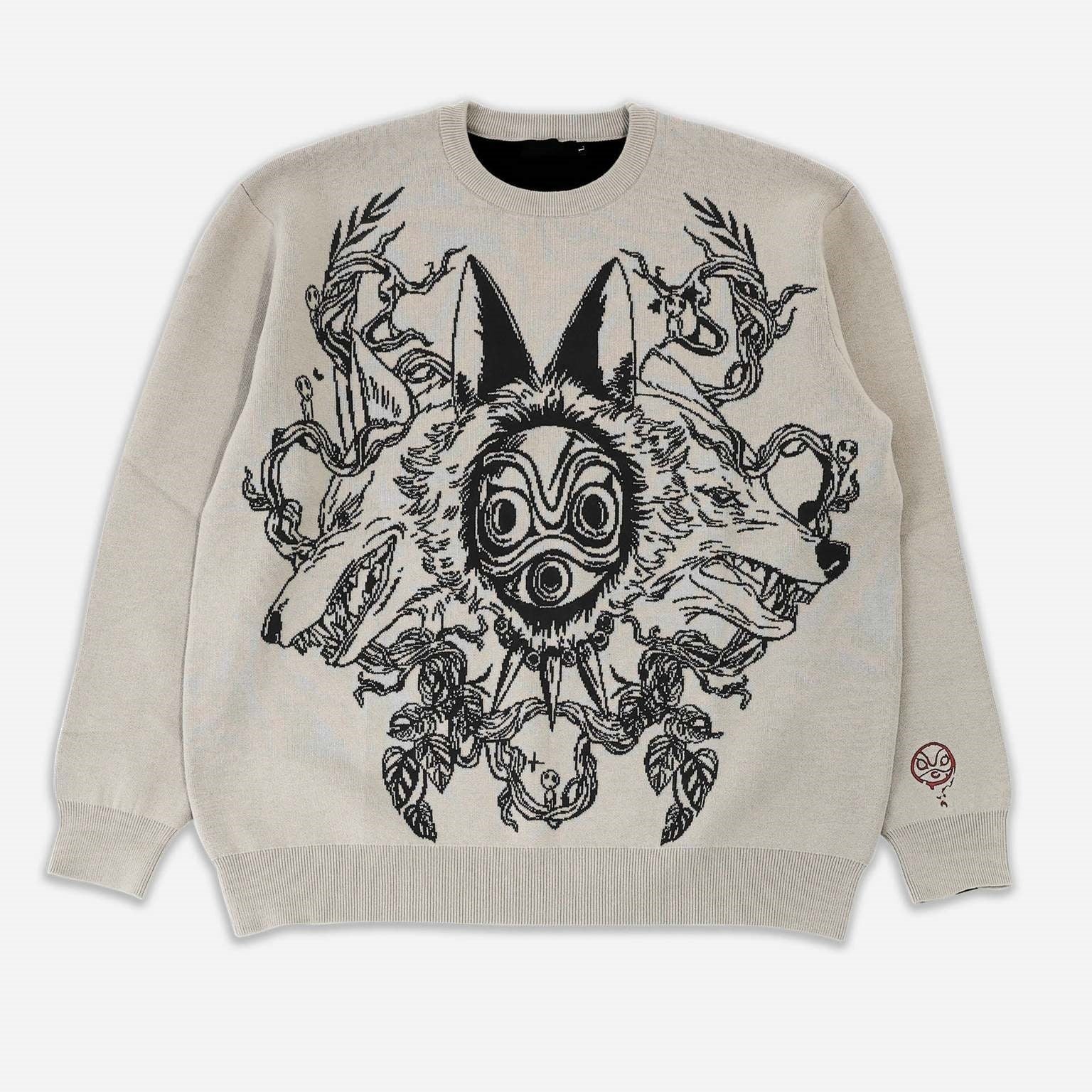 Discover Seakoff's beige sweatshirt, inspired by Princess Mononoke. Featuring a stylized wolf spirit mask with pointed ears, organic patterns, and a circular motif in black. A red claw design near the sleeve adds to the eco-warrior vibe. Available as part of our anime streetwear collection.