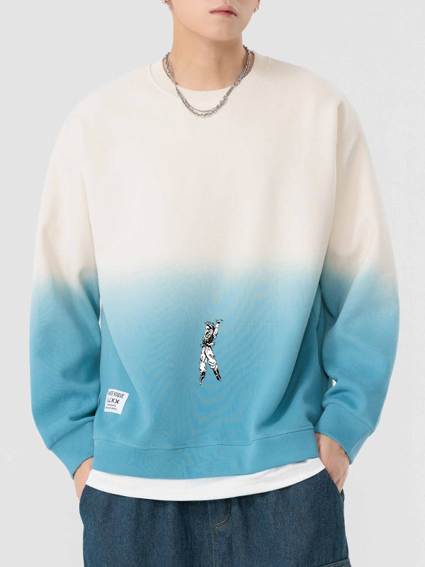 Someone is wearing an SEAKOFF Limited Edition Dragon Ball Sweatshirt with a Goku Spirit Bomb gradient design (white-to-blue) and a small graphic. They&