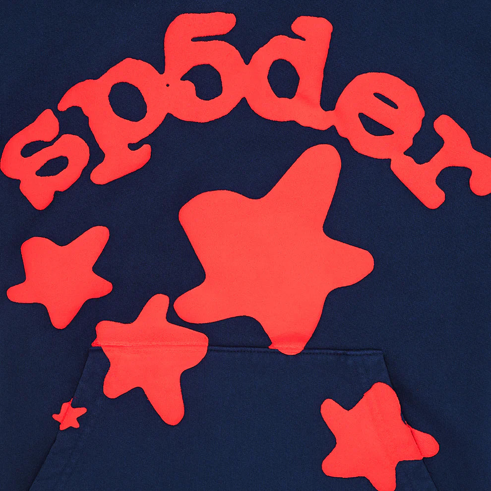 The Sp5der 440GSM Heavyweight Hoodie in navy blue features bold red puff print lettering and large and small star designs—some overlapping the front pocket—for a true Y2K streetwear look.