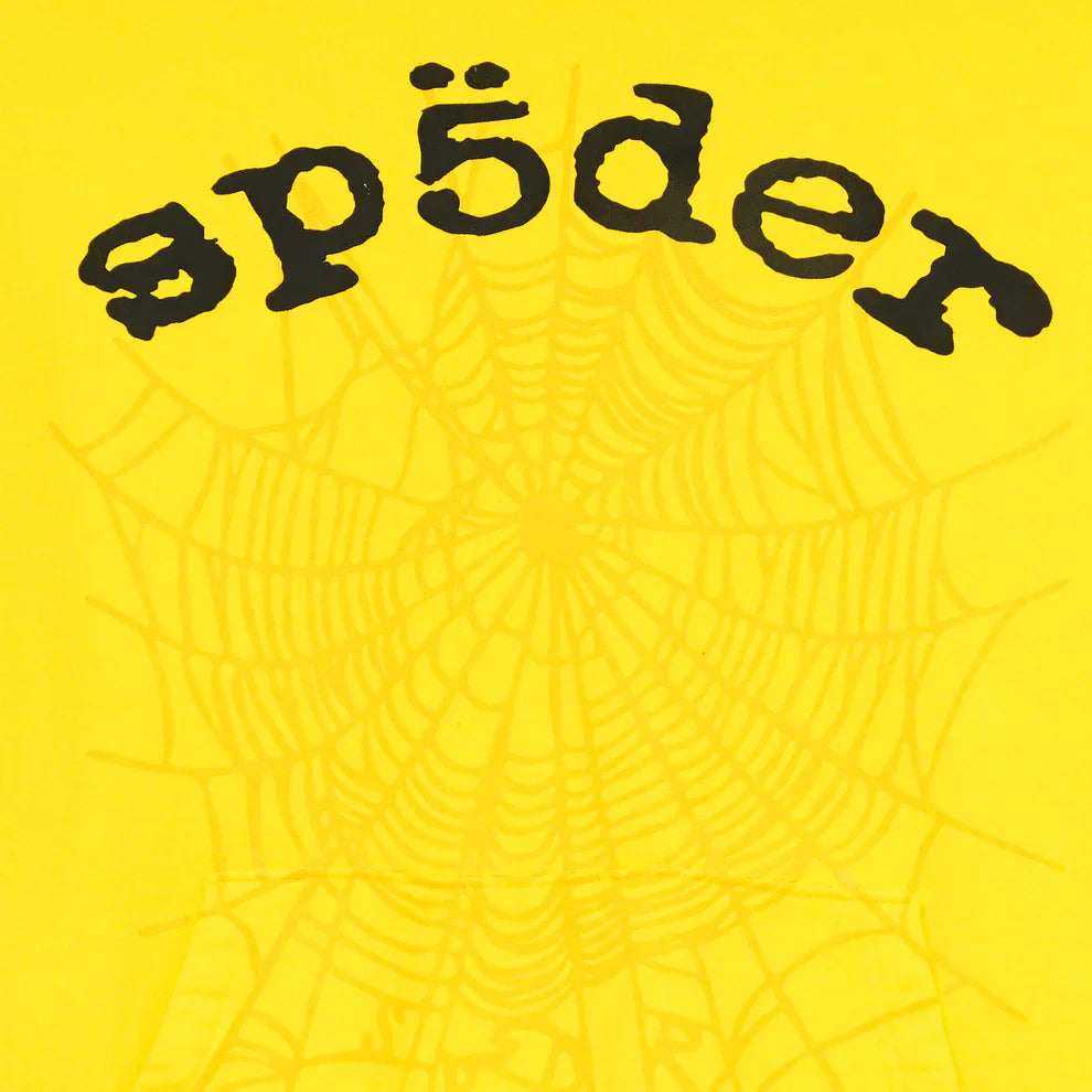The Yellow Graphic Hoodie with Spider Web Print and Lettering features playful “spīder” text above a subtle web on bold yellow—a comfort fit pullover ideal for fans of unique streetwear.