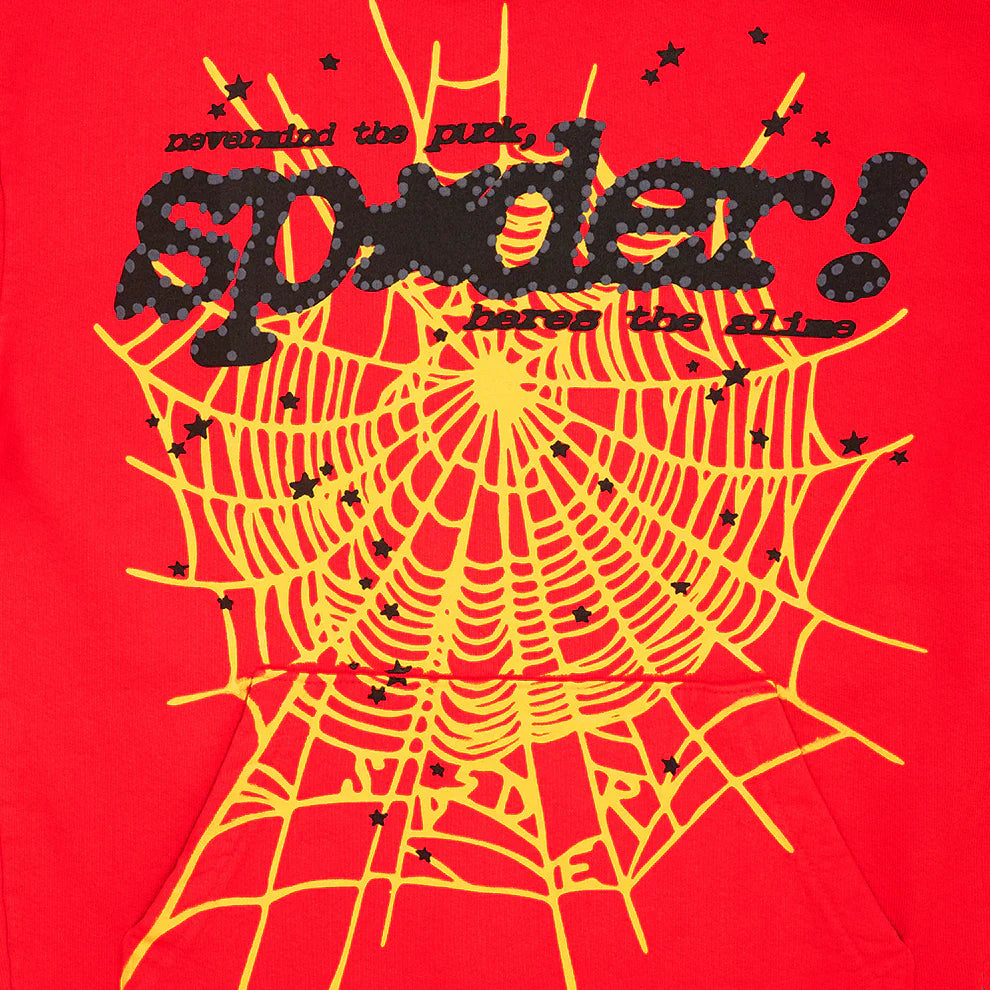 The Red Graphic Hoodie with Spider Web Print and Star Details is a comfort fit pullover featuring a bold yellow web on red, black dot-patterned "spider!" text, “never mind the punk, here’s the silk,” and small star accents—perfect for streetwear.