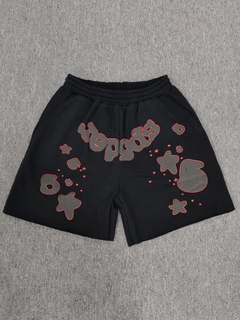 Sp5der black cotton jogger shorts with red outline bubble lettering and star graphic print on front panel