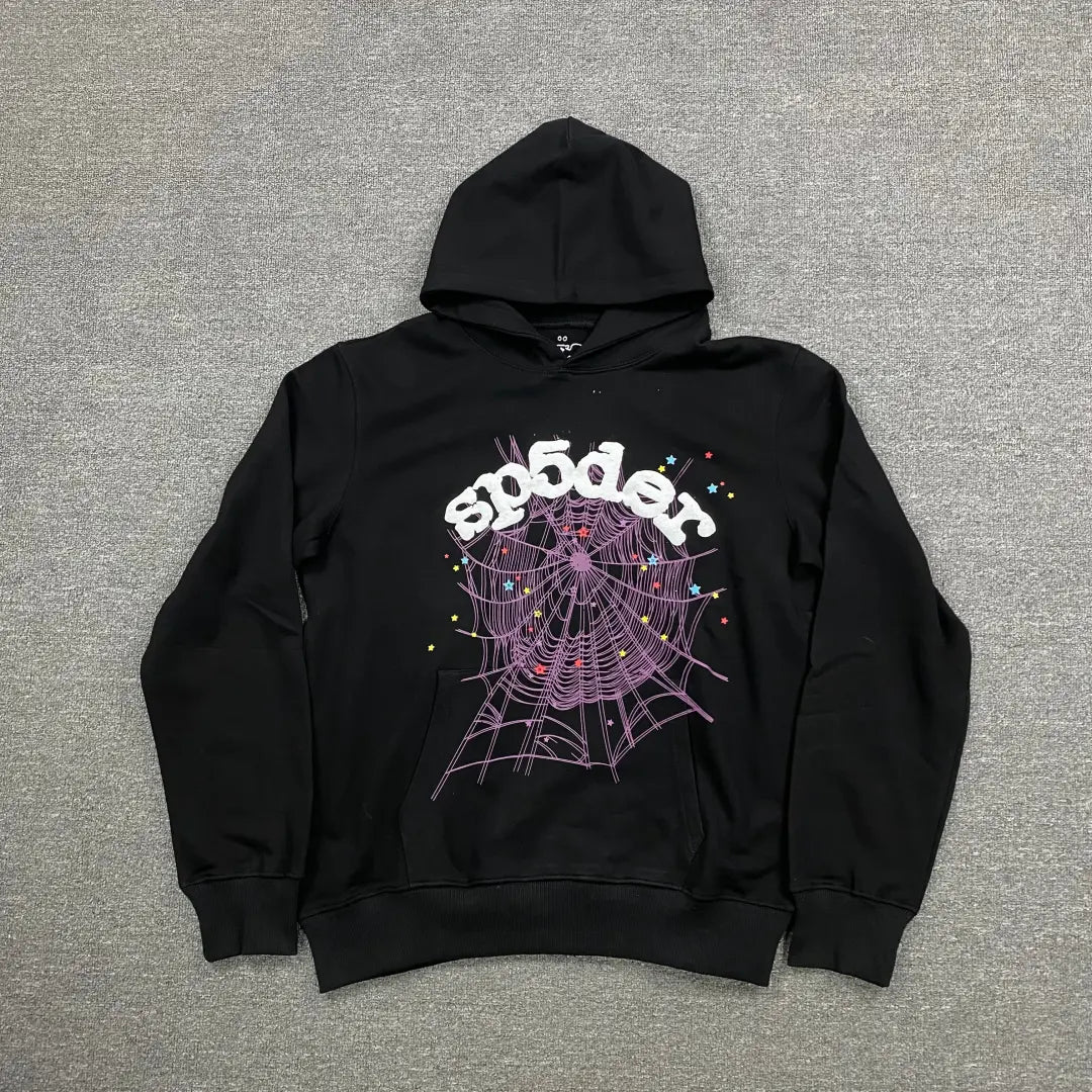 The Black Sp5der Web Hoodie 440GSM features a bold purple web and white stars on the front, "sp5der" in striking white lettering above, making this black spider hoodie a standout choice for streetwear style.