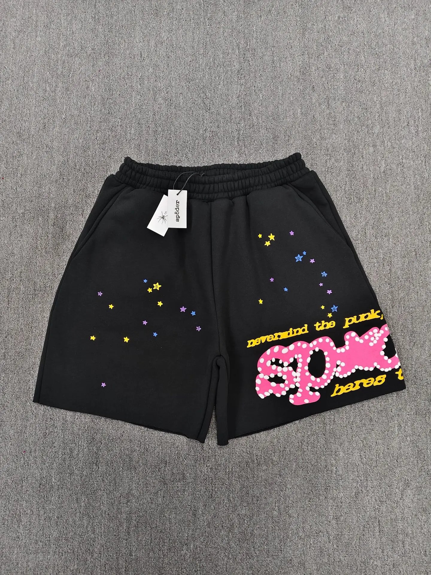 Sp5der black cotton jogger shorts with multicolor star print and pink logo graphic on front