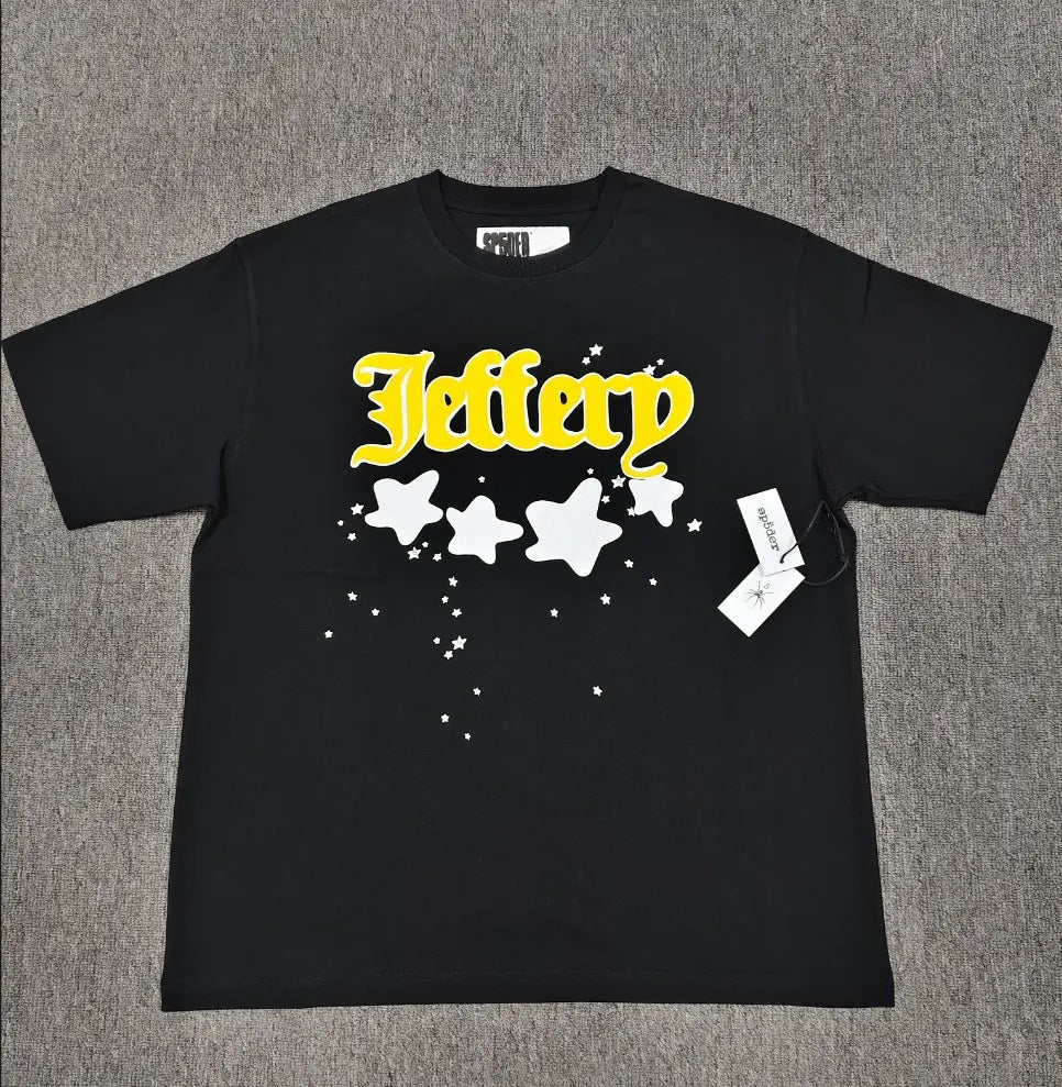 Sp5der black t-shirt with yellow Jeffery old English graphic and white star print on the chest