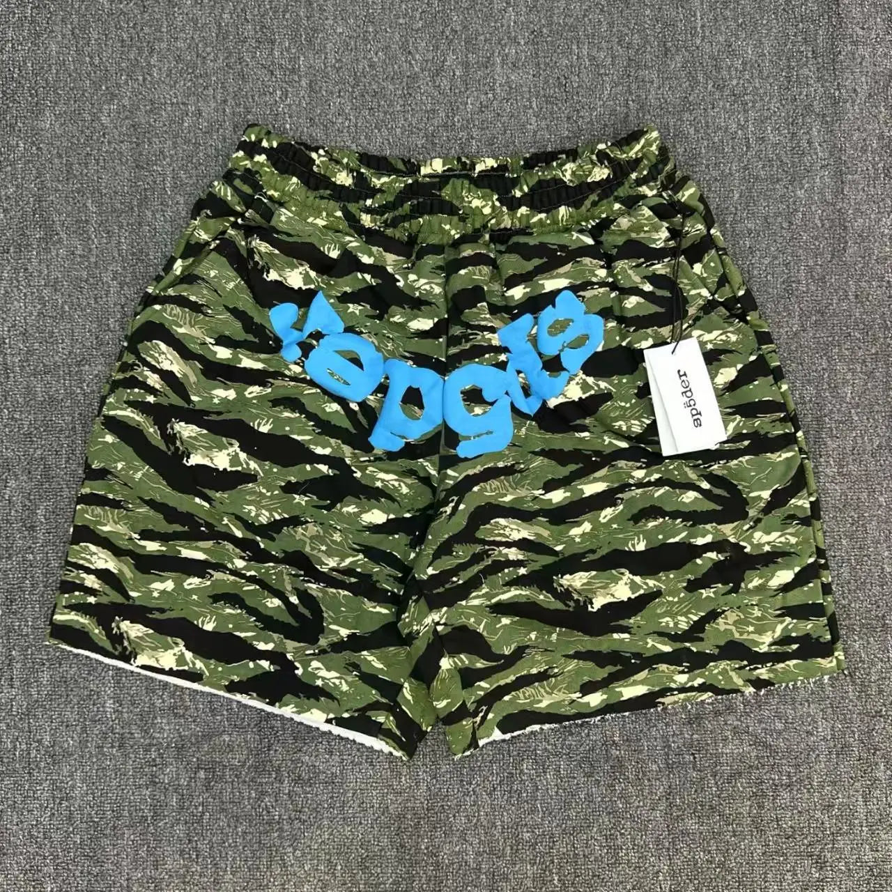 Sp5der green and black tiger camo jogger shorts with blue front logo graphic