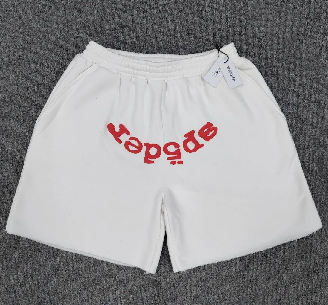 White Sp5der jogger shorts with red mirrored letter print on the front and elastic waistband
